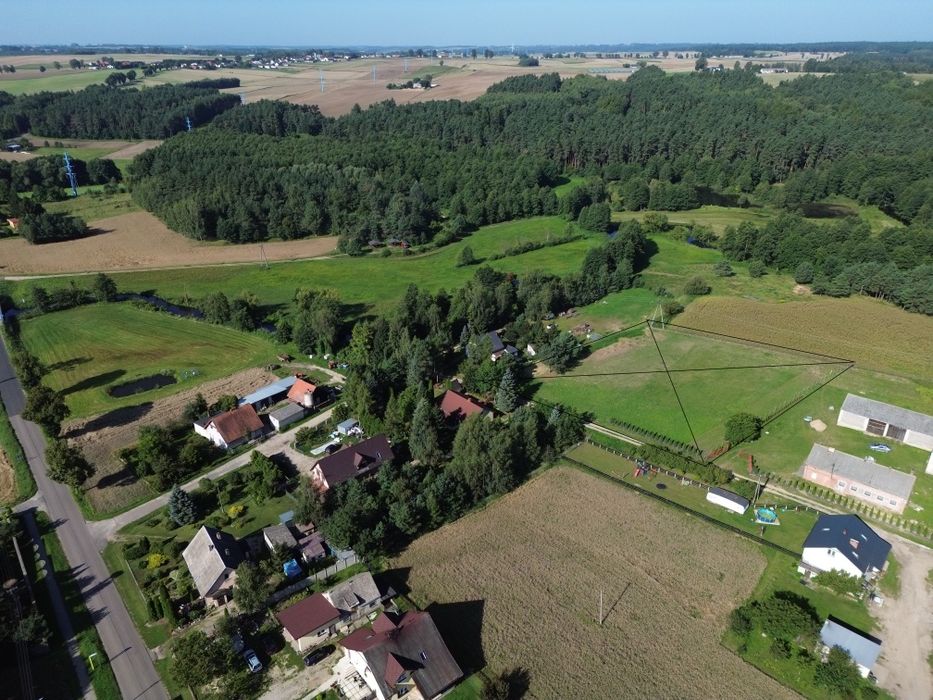 Działka 4000 m² z WZ | Rzeka Wel 100 m | Jezioro 400 m | Ogrodzona
