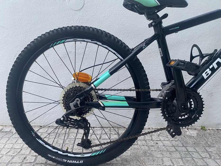 Bicicleta rockrider preta e azul turquesa roda 24