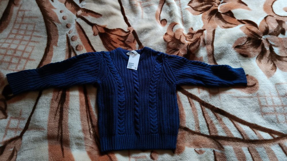 Nowy sweter z warkoczem H&M