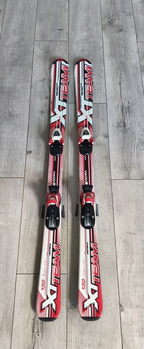 Narty zjazdowe TecnoPro XT Team 130 cm z wiązaniami – stan dobry!