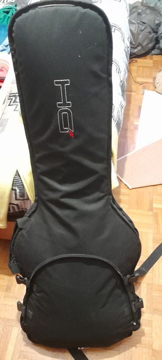 Guitarra, amplificador e mochila