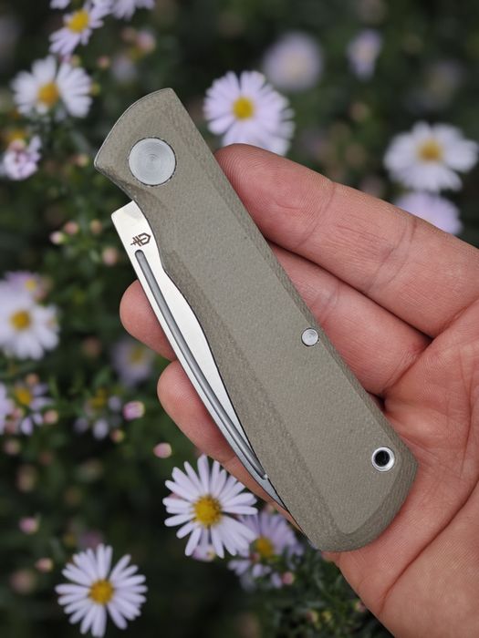 Ніж складний Gerber Mansfield , замок Slip Joint, накладки Natural Micarta , клинок D2,полировка Satin, упаковано в коробку.