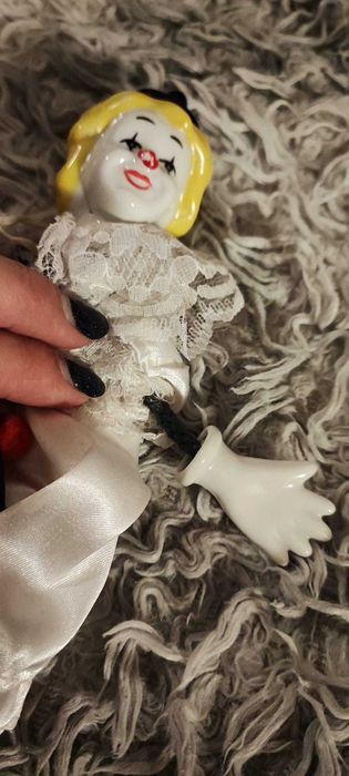 Palhaço boneca porcelana - danos