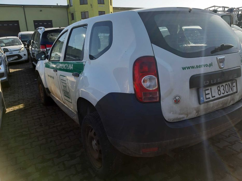 DACIA DUSTER I OV369 lampa maska klapa błotnik drzwi zderzak części