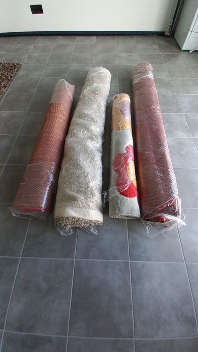 Conjunto 4 tapetes usados.