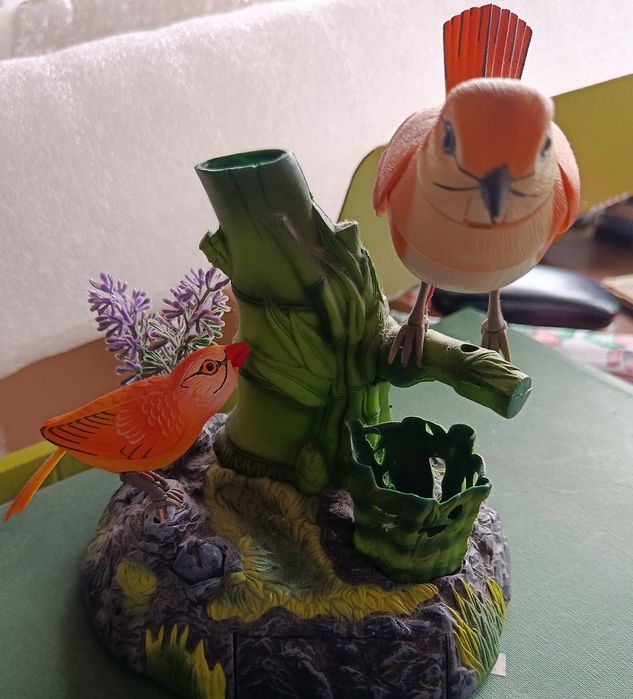 Peça decorativa com pássaros