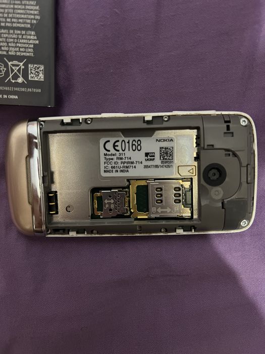 Продам сенсорный  Nokia 311 состояние отличное,рабочий