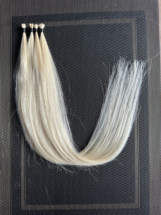 Натуральные волосы на капсуле