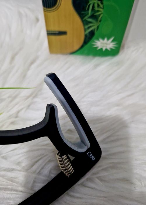 Capo guitarra novo