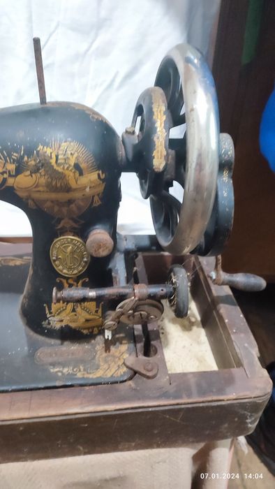 Ручна швейна машина Singer.