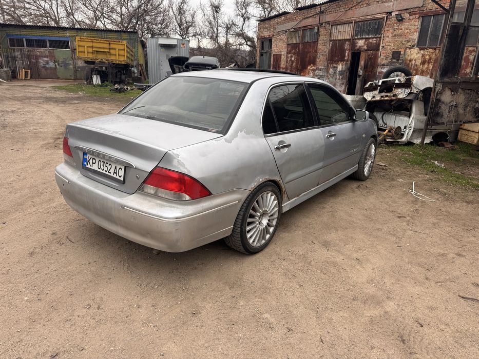 Лансер 9 вираж 1.8