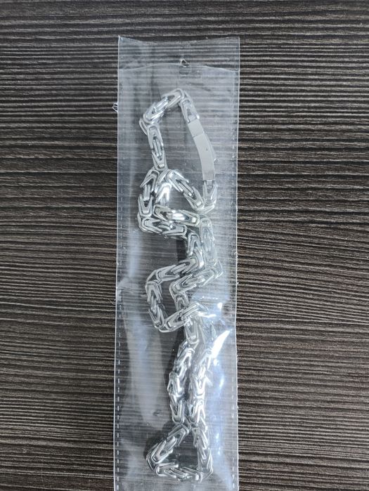 Łańcuszek męski stal szlachetna 56 cm. Waga 64,57g.