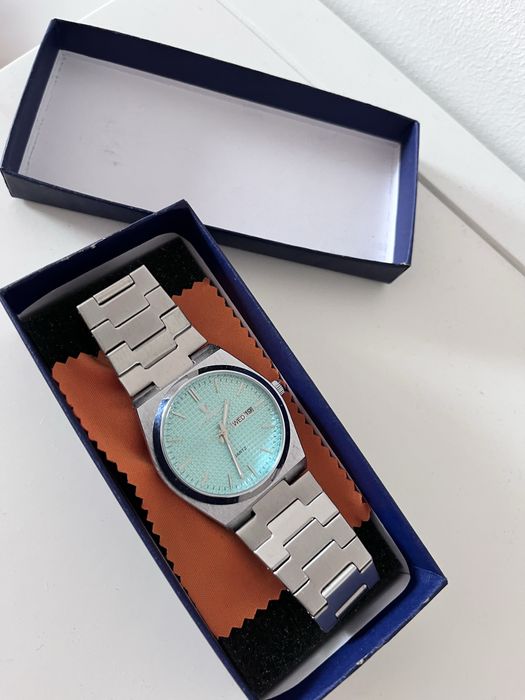 Relógio Pelvini Dante Prateado e Azul Turquesa