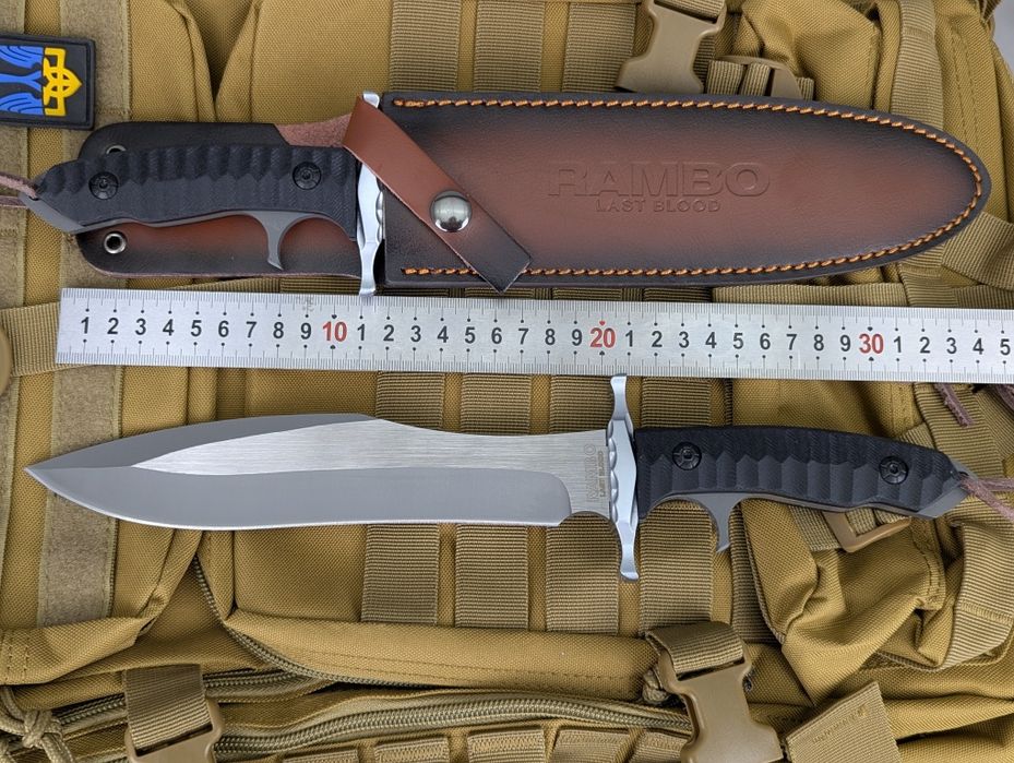 Великий тактичний ніж. Нож с кожаным чехлом.