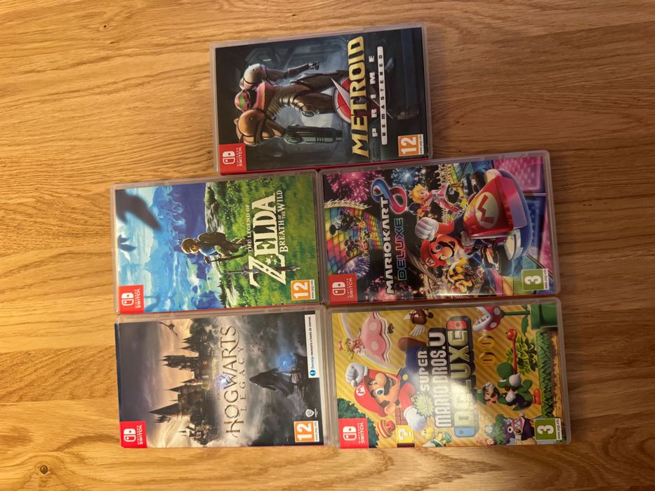 Nintendo Switch OLED + 5 gier + Pro Controller + etui