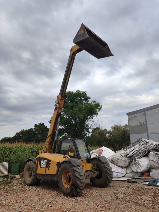 Ładowarka teleskopowa cat th 337 zamiana