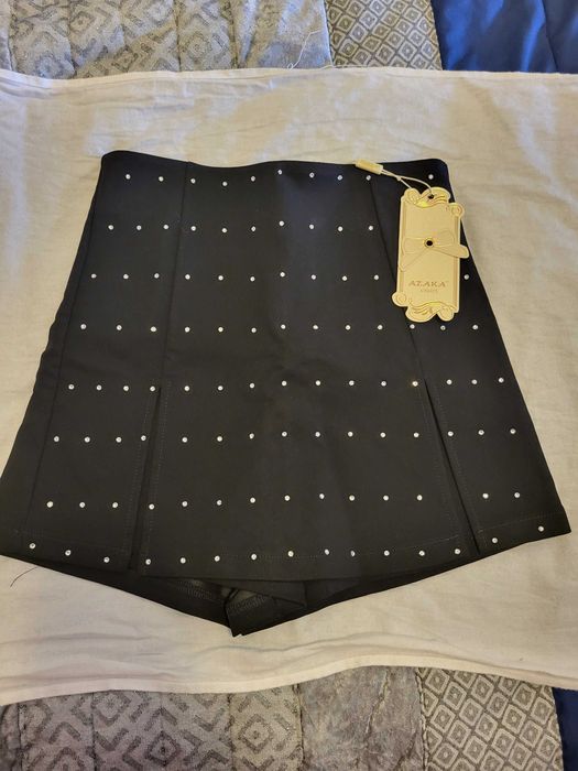 Saias calções pretas novas