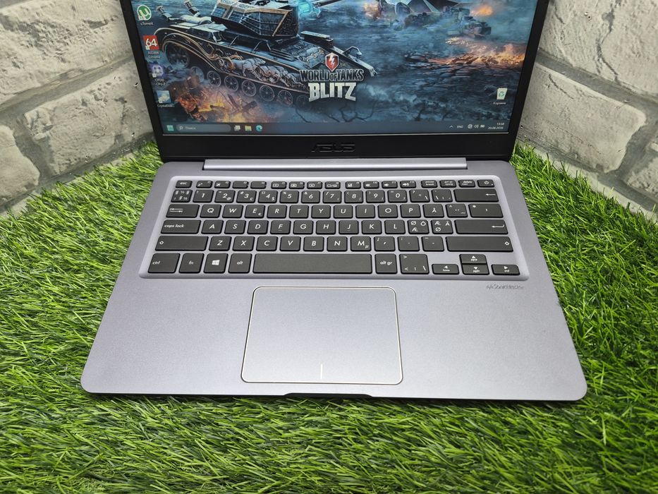 Магазин:Asus E406M / Celeron N4000 / 4ГБ / 64ГБ SSD / Intel UHD 600 / Ноутбук Full HD