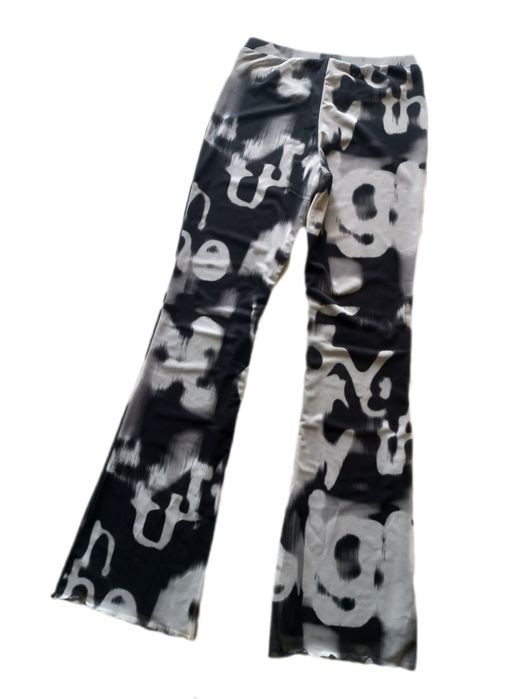 брюки кльош в сіточку Weekday