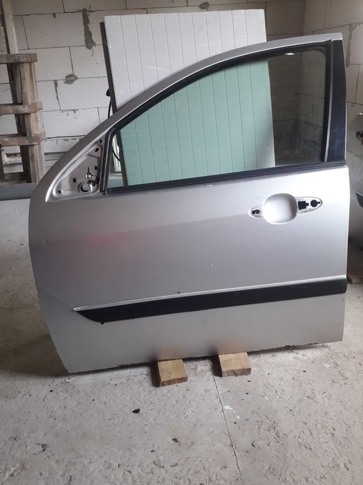 Двері Форд Фокус МК 1 хетчбек