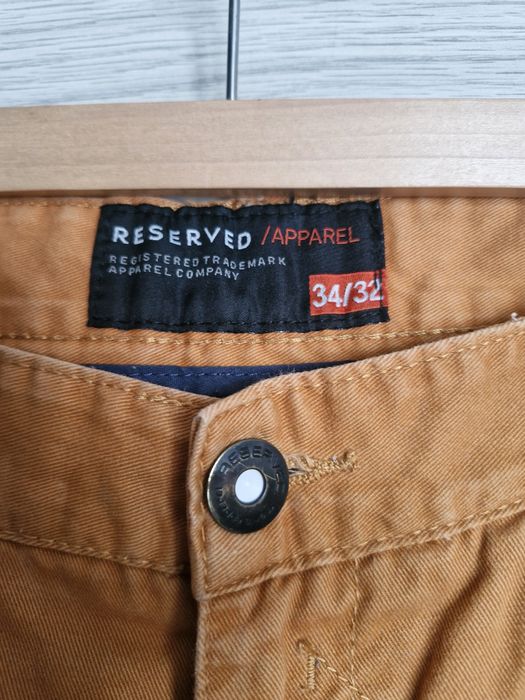 Długie spodnie męskie Reserved