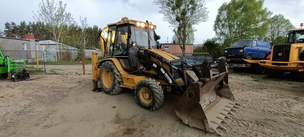 koparko ładowarka CAT 428c widły teleskop krokodyl 4x4 manual