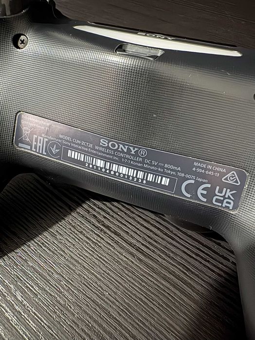 Comando PS4 Sony DualShock 4 V2 + Base de Carregamento OIVO