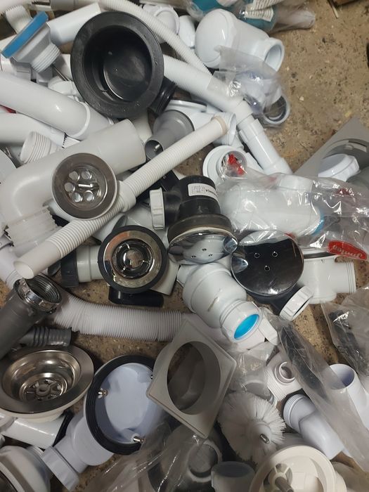Lot of traps, elbows, drain pipes, etc.64752322941953121