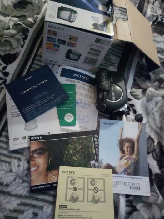 Видеокамера,бинокль,фотоаппарат три в одном