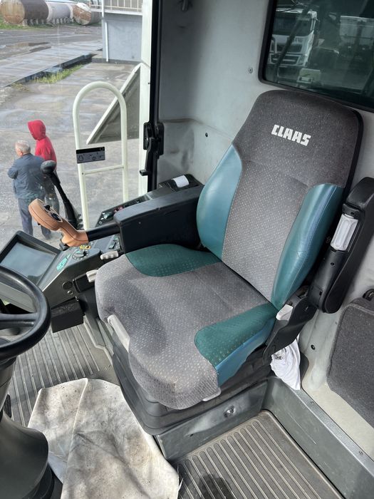Claas Lexion 480 на гусеницях 2003 рік випуску