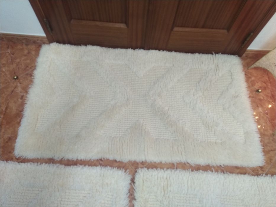 Tapetes de pelo alto.