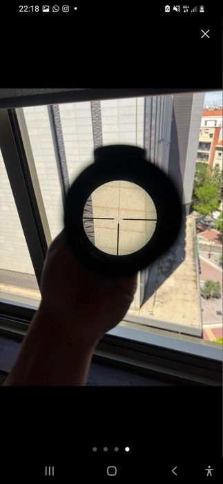 Vendo mira telescópica Roolls 3-12-56 com reticulo iluminado.