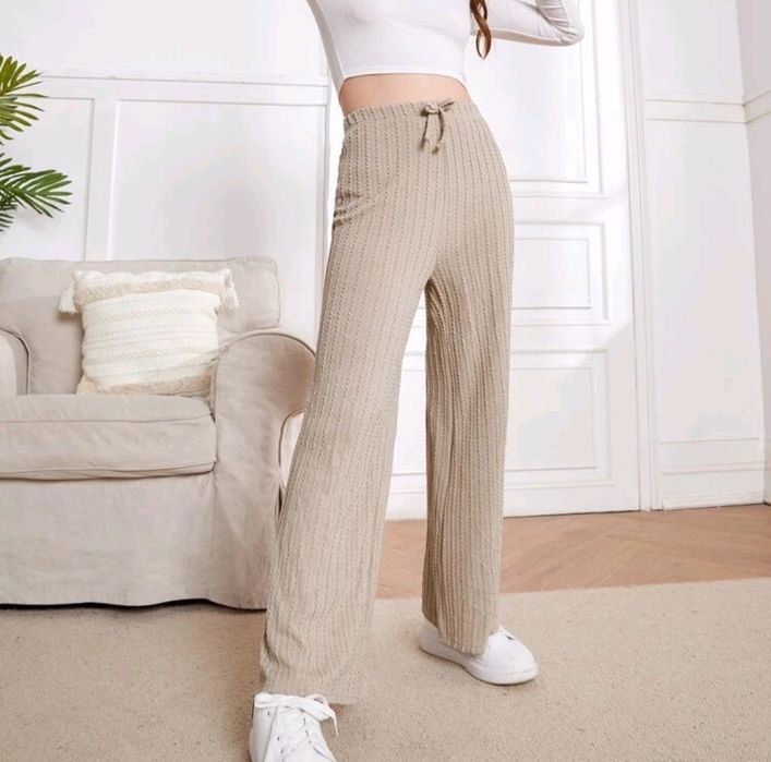 Nowe spodnie z szerokimi nogawkami 134 8-9 lat