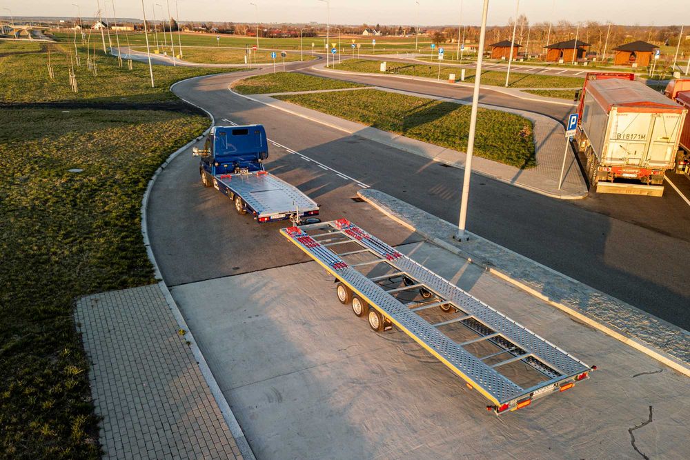 Pomoc drogowa Holowanie Autolaweta Transport Aut  Polska