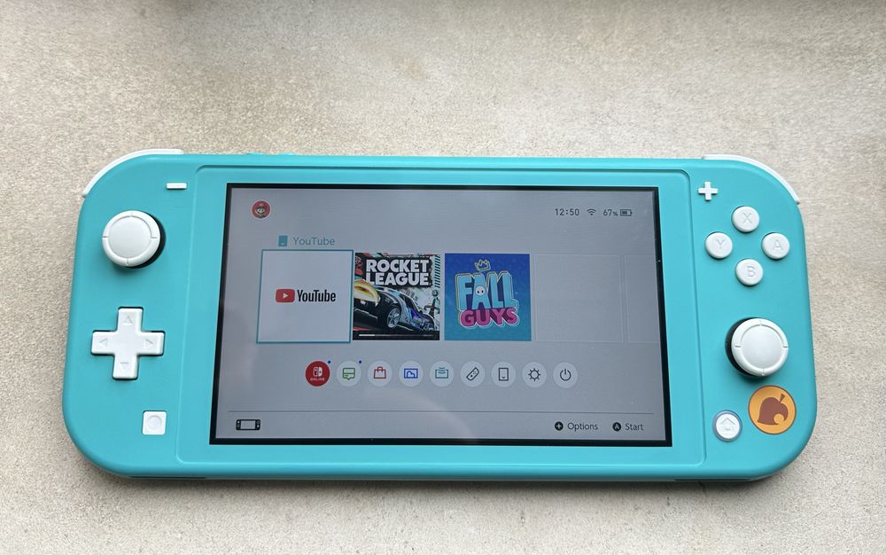 Nintendo switch lite com animal crossing e sd 8gb