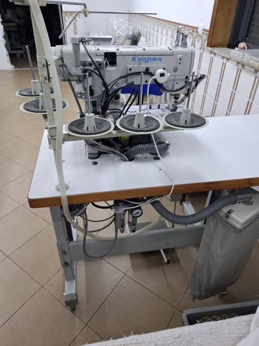 Máquina de aparar bainhas