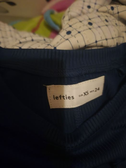 Conjunto de calça, brinco e blusa