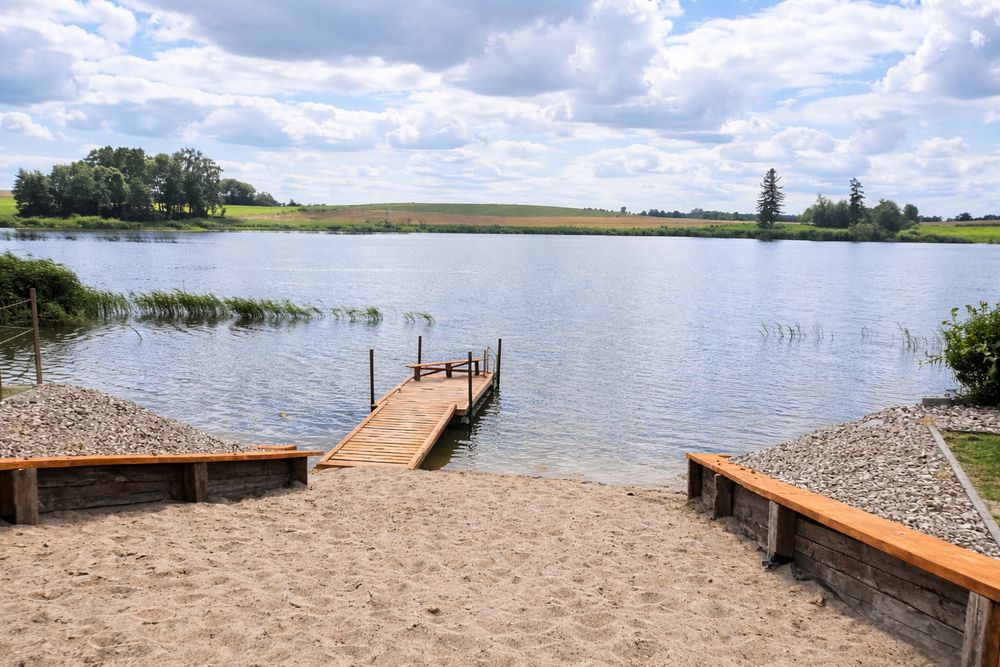 Dom wynajem Mazury Houses balia, basen, plac zabaw, trampolina, pomost