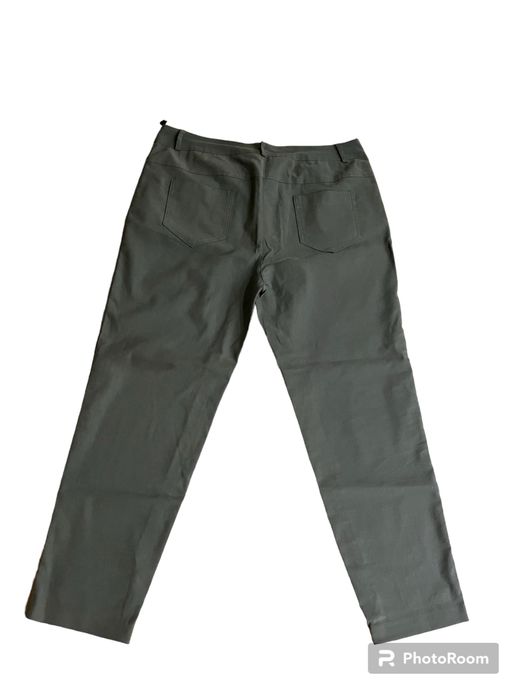 Materiałowe spodnie damskie kolor khaki rozmiar 40/42 L XL