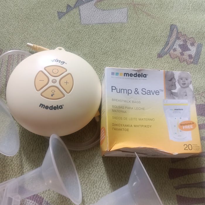 Молокоотсос Medela Swing б/у