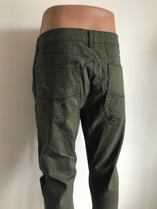 Nowe rurki spodnie dziury material meskie zielone khaki L