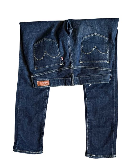 Stylowe damskie dżinsy  Levi's kultowy model Slight Curve W29 L32