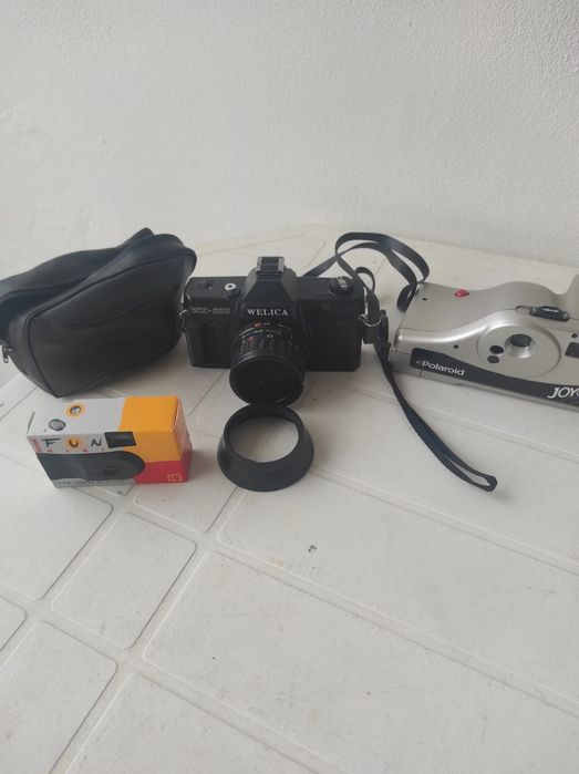 Conjunto de três máquinas fotográficas