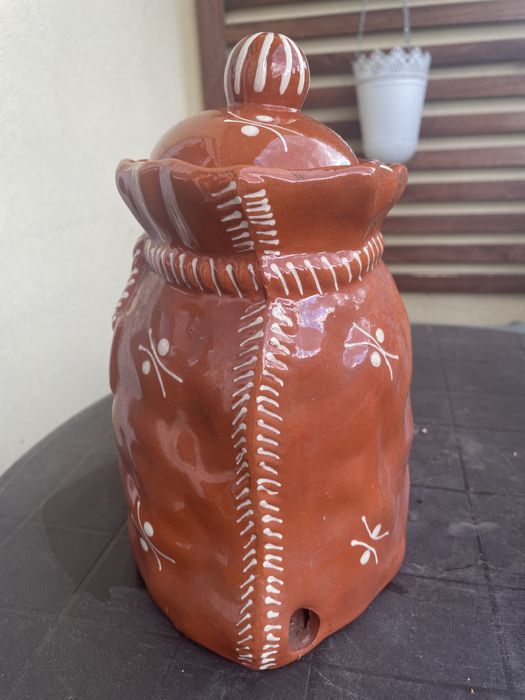 Recipiente para guardar cebolas