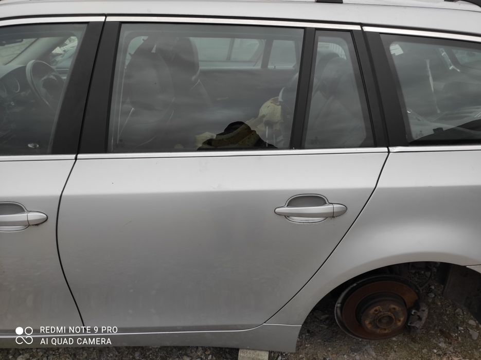 Drzwi lewe tylne BMW E61 titansilber 354/7 ładne w kolor