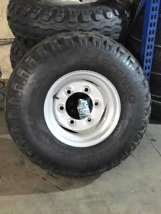 Koła balonowe 11.5/80-15.3/14PR do przyczepy lub rozrzutnika