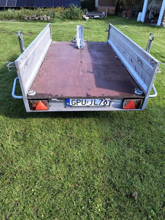 Przyczepa lekka Blyss uchylna burta.