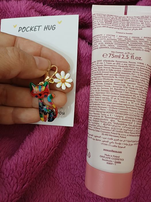 Creme de mãos Oriflame e chaveiro Gato