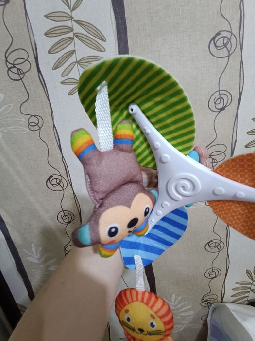 Іграшка на коляску