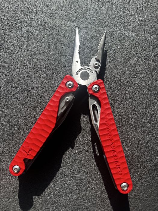 leatherman charge plus red g10